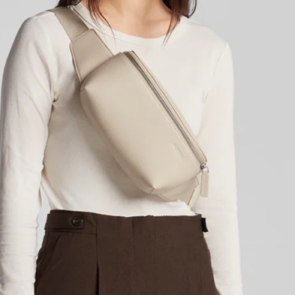 monos Handbags - Nwot monos sling bag Ivory (Vegan Leather)